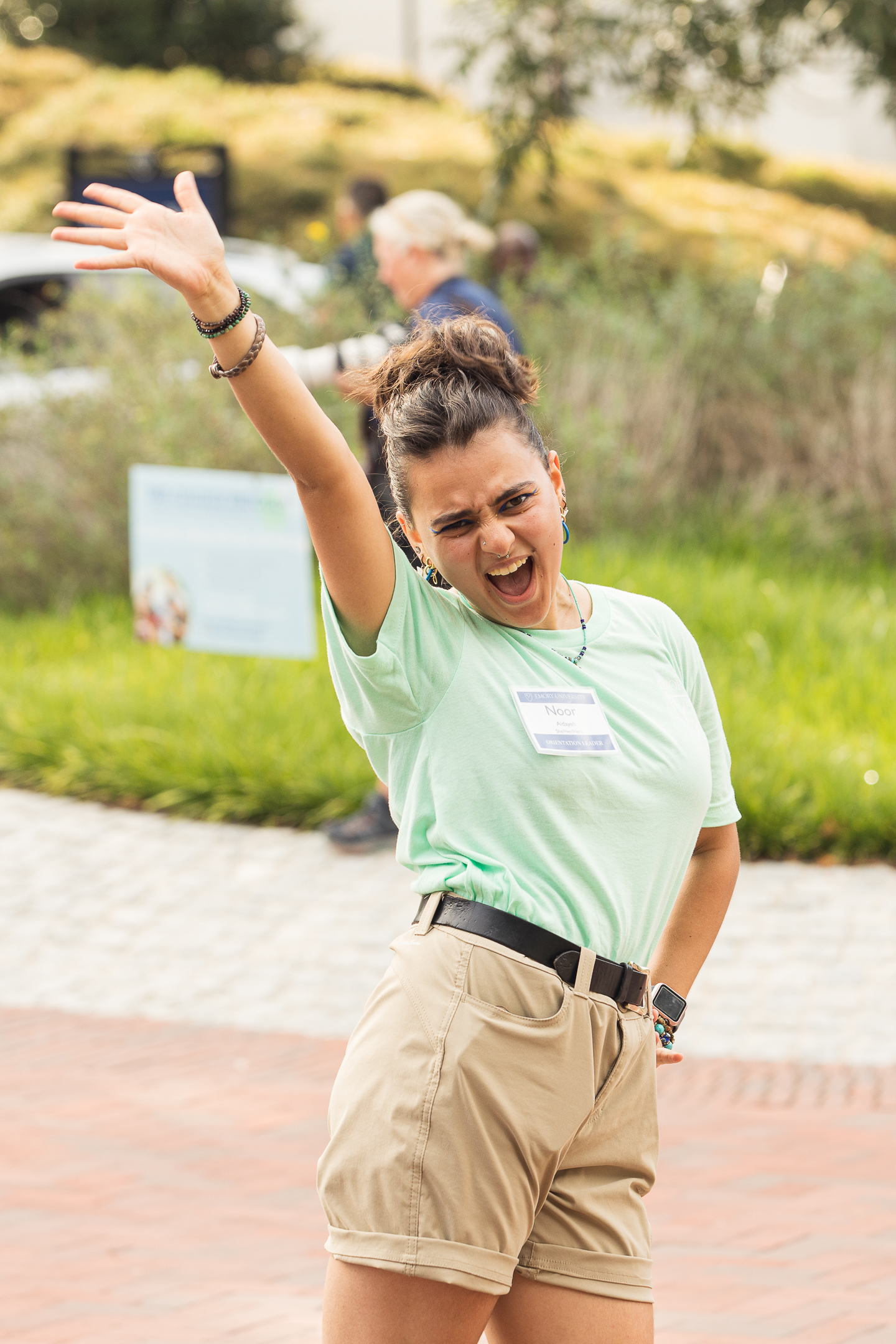 student orientation leader with hand in air brandon clifton atlanta photographer